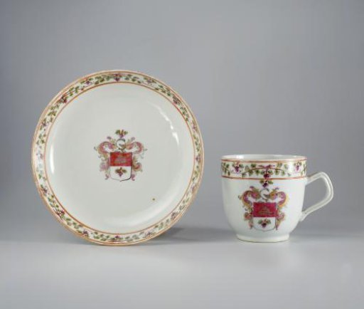 Cup with handle with a coat of arms and a monogram