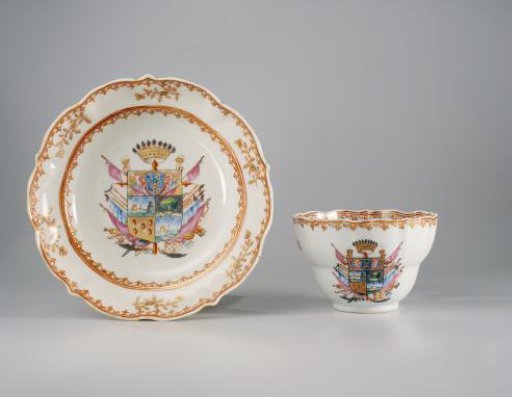 Cup with handle with a coat of arms, flower sprays and spearhead-borders