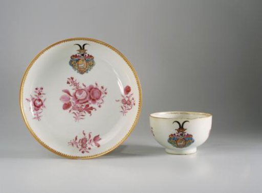 Cup with handle with flower bouquets and a coat of arms