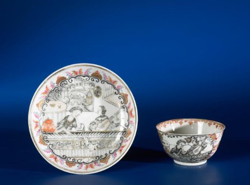 Saucer with a woman and a man with a mandolin