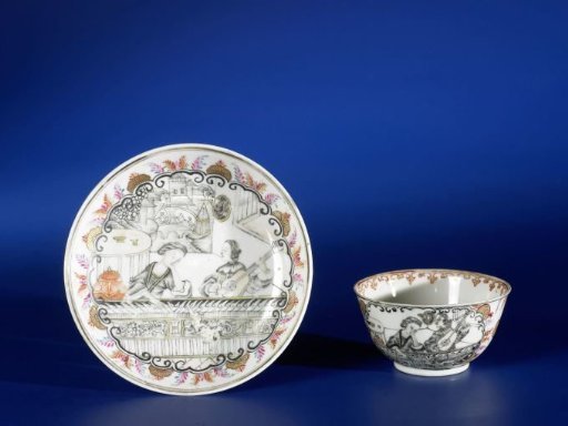 Bell-shaped cup and saucer with a woman and a man with a mandolin