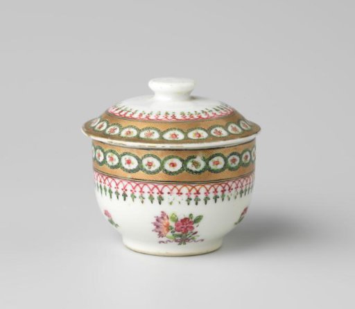 Covered jar with bouquets, scattered flowers and ornamental borders