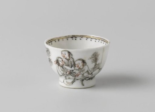 Cup with four people in a landscape