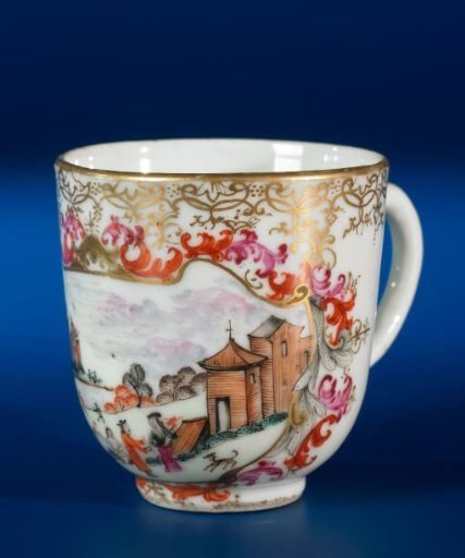 Cup with handle with a European waterlandscape in a panel