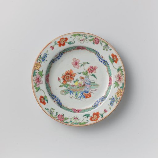 Plate with precious objects and flower sprays