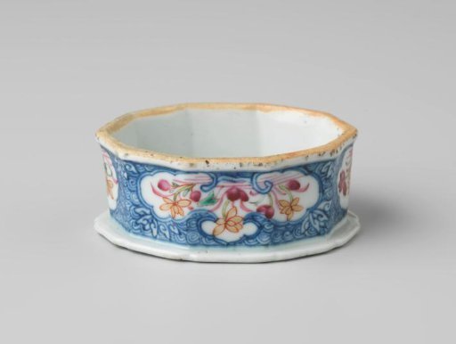 Oval decagonal salt celler with flowering lotus plants