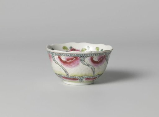 Bell-shaped cup with undulating flower petals on diaper pattern and flower sprays