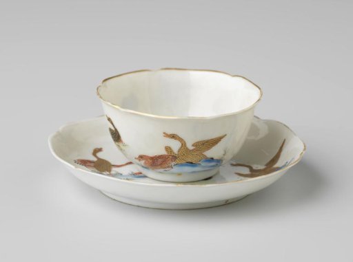 Bell-shaped cup and saucer with eight geese
