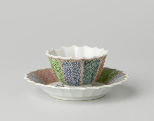 Bell-shaped cup and saucer with a putto holding a lotusbranch