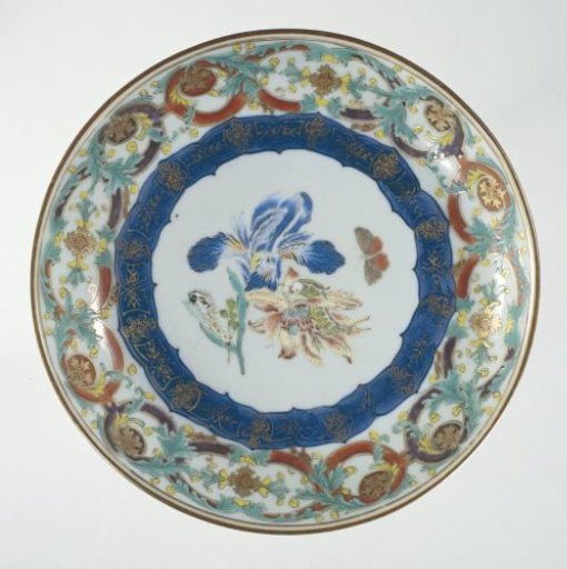 Saucer-dish with flowers, butterfly and ornamental borders
