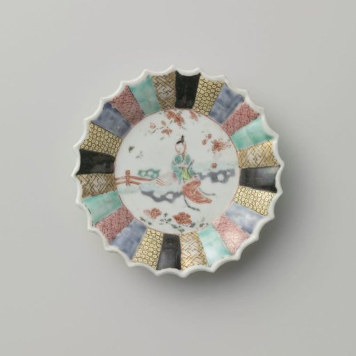 Saucer with a woman in a garden and diaper patterns on various colored grounds