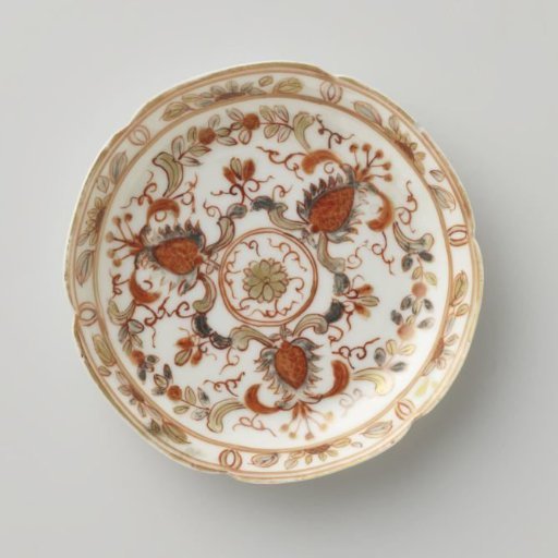 Saucer with scrolls and stylised flowers