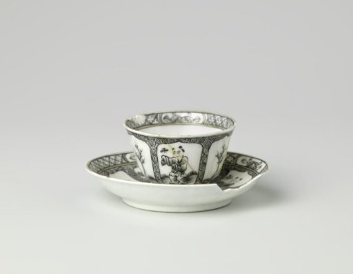 Cup and saucer with a boy and a butterfly in a landscape