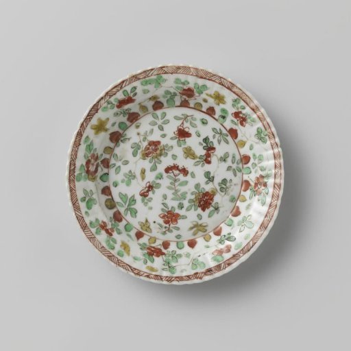Saucer with scattered flower sprays and border of standing petals
