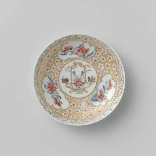 Saucer with a flower basket and flower sprays