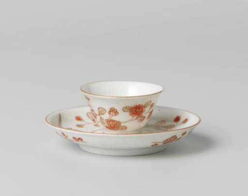 Cup and saucer with different flower sprays