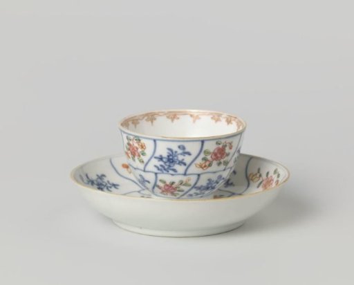 Straight-sided cup and saucer with petal-shaped panels with flower sprays