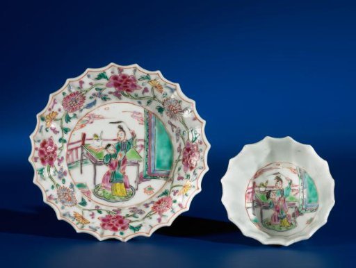 Saucer with a lman and woman on a terrace