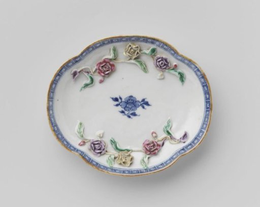 Saucer with moulded flower sprays