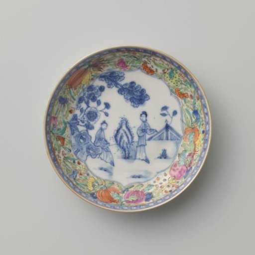 Saucer with two women in a fenced garden and flower scrolls