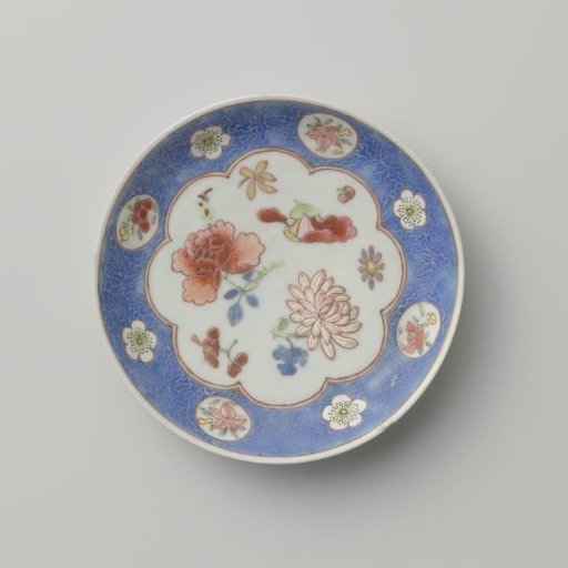 Saucer with incised lotus scrolls and flowersprays in cartouches