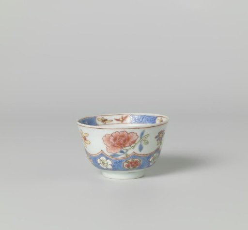 Cup with incised lotus scrolls and flowersprays in cartouches