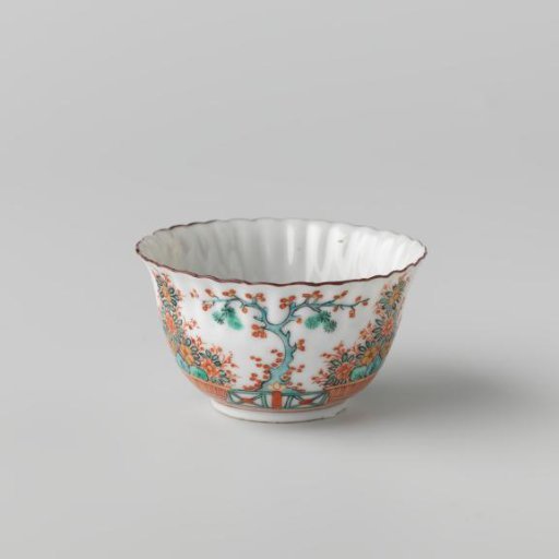 Bell-shaped cup with fluted sides with a flower basket and a tree behind a fence