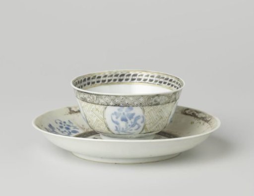 Bell-shaped cup and saucer with flower sprays and ornamental borders