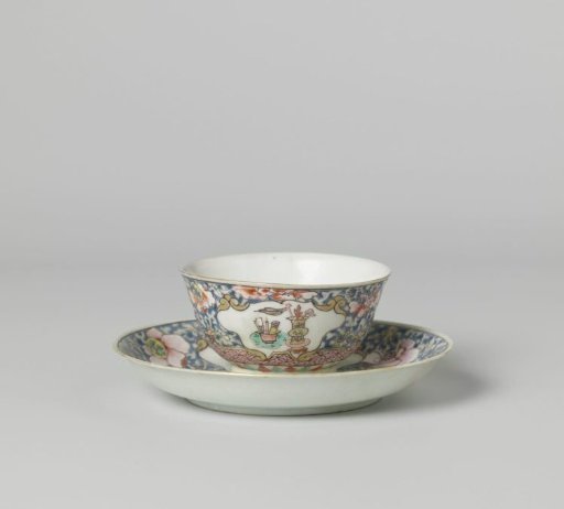Bell-shaped cup and saucer with antiquities in panels on a ground of floral scrolls