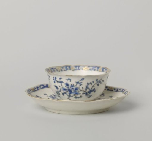 Bell-shaped cup and saucer with three groups of floral scrolls