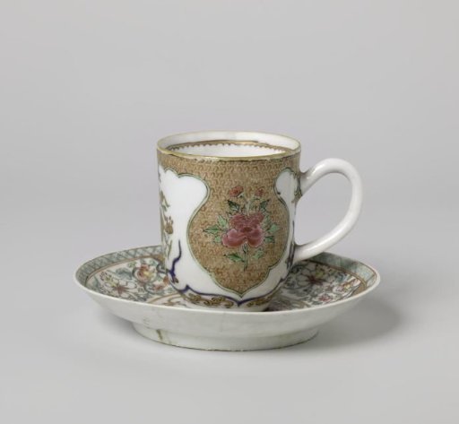 Cup with handle and saucer with fruit basket, flower basket and floral scrolls