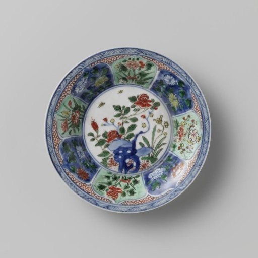 Saucer with rocks and flower sprays in petal-shaped panels