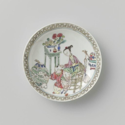 Saucer with woman, boy and precious objects