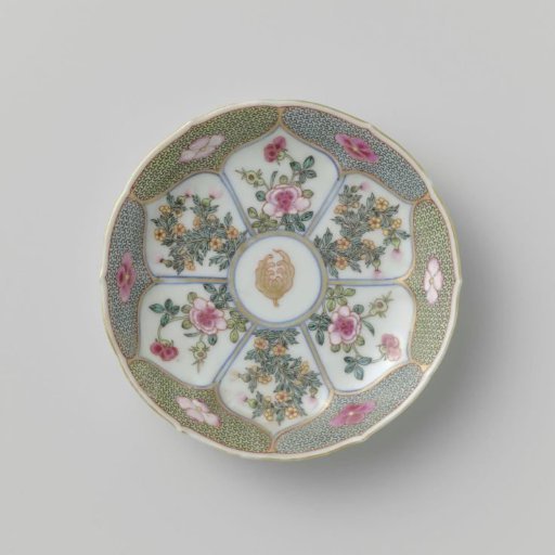 Saucer with moulded petal-shaped panels with flower sprays