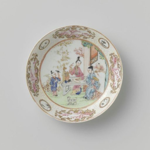 Saucer with two women and two boys in a fenced garden near a pavilion