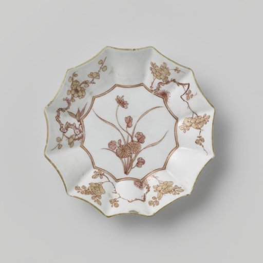 Saucer with a flowering plant in a scalloped medallion and four prunus sprays