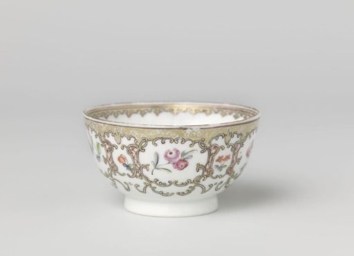 Cup with flower sprays and panels made from scrolls