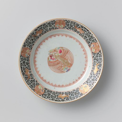 Plate with a stylized pelican and fish