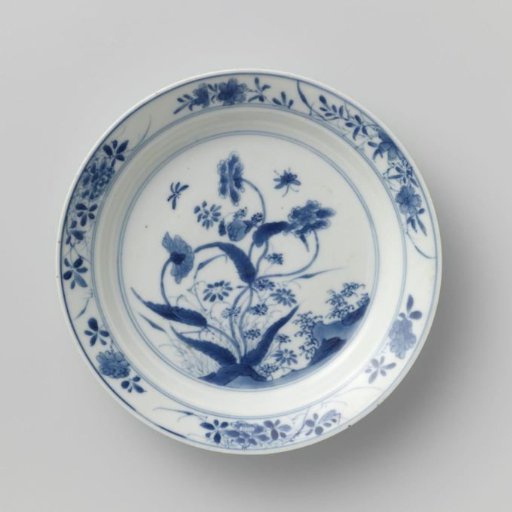 Plate with rocks, flower sprays and butterflies