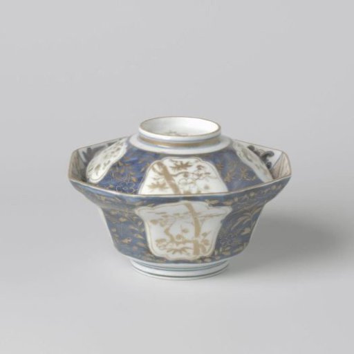 Octagonal covered bowl with flowering plants in panels and flower sprays