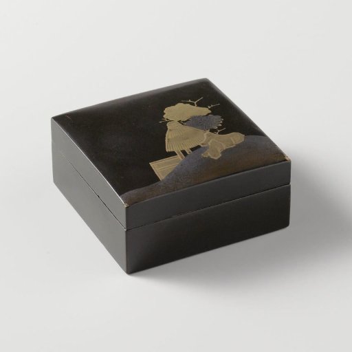 Square box with a landscape in gold on a black ground