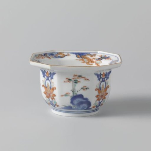 Octagonal bowl with flowering plants near a rock and floral scrolls