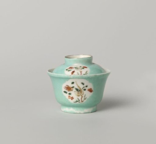 Bell-shaped covered cup with flowering plants in shaped panels
