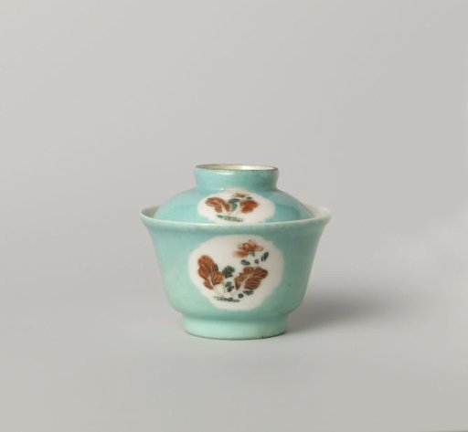 Bell-shaped covered cup with flowering plants in shaped panels