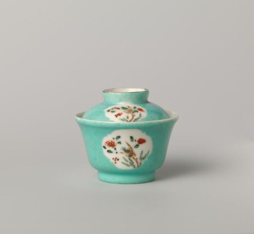 Bell-shaped covered cup with flowering plants in shaped panels
