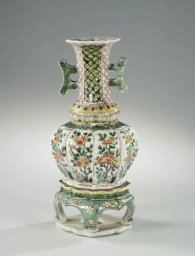 Octagonal vase with two handles, flowering plants and diaper pattern on a seperate stand