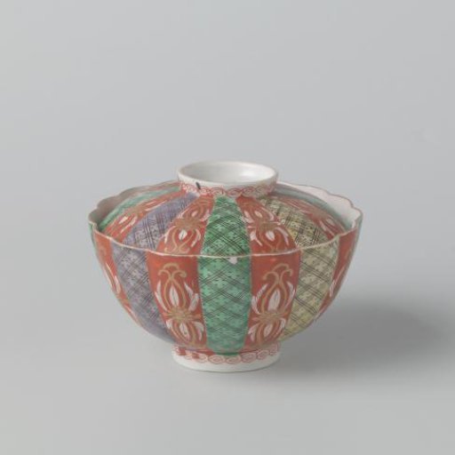 Covered bowl with scrolls, diaper pattern and scattered flowers