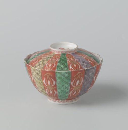 Covered bowl with scrolls, diaper pattern and scattered flowers
