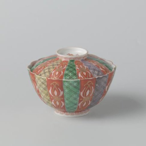 Covered bowl with scrolls, diaper pattern and scattered flowers