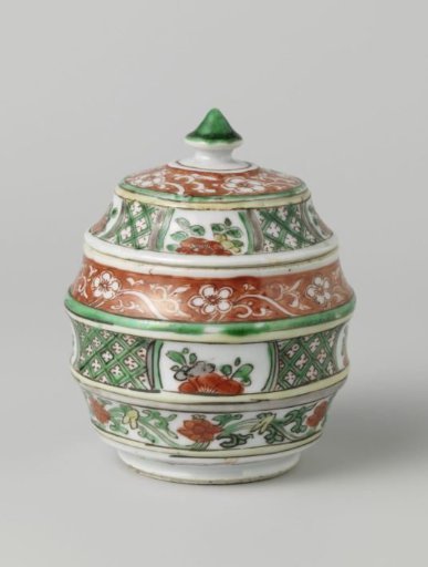 Barrel-shaped covered jar with flower scrolls and geometric patterns